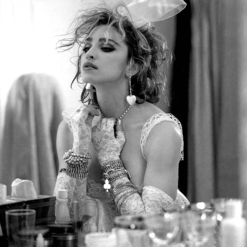 Like a Virgin 1984 album cover Madonna dressed as bride sexy lingerie Boy Toy belt